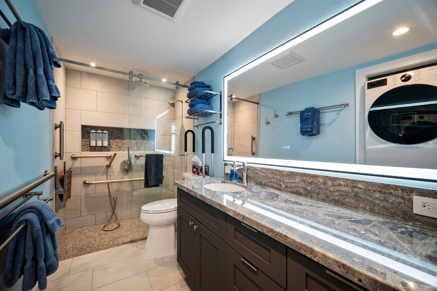 Extra-tall elongated toilet with grab bars