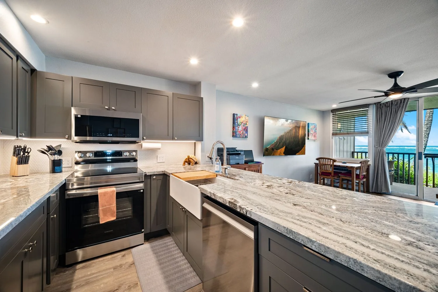 Kitchen with apron sink and range